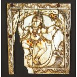 An Indian Carved Ivory Panel, 18th Century, mounted on wood, the carving depicting Krishna dancing