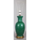 A LARGE 19TH/20TH CENTURY CHINESE GREEN CRACKLEGLAZE PORCELAIN VASE, fitted for electricity, 25.