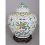 A CHINESE WANLI STYLE ENAMELLED PORCELAIN DRAGON & PHOENIX JAR & COVER, together with a fitted