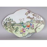 A CHINESE FAMILLE ROSE QUATREFOIL PORCELAIN BOYS PLAQUE, 14.5in x 10.1in at widest points.