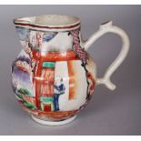 AN 18TH CENTURY CHINESE FAMILLE ROSE MANDARIN PORCELAIN JUG, painted with a scene of figures sitting