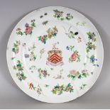 AN UNUSUAL EARLY/MID 19TH CENTURY CHINESE FAMILLE ROSE ARMORIAL PORCELAIN PLATE, with the coat of