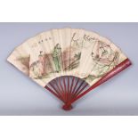 AN UNUSUAL EARLY 20TH CENTURY CHINESE PAPER FAN, with red lacquered wood sticks and guards, together