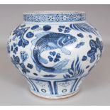 A CHINESE YUAN STYLE BLUE & WHITE PORCELAIN CARP JAR, the base unglazed, 9.4in wide at widest