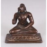 A Small Bronze Figure of a Tamil Saint, South India, 18th/19th century, seated in sattvasana, his