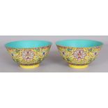 A PAIR OF CHINESE YELLOW GROUND FAMILLE ROSE LOTUS BOWLS, each interior turquoise, each base with