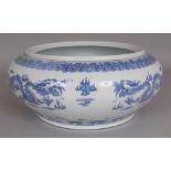 A 20TH CENTURY CHINESE BLUE & WHITE PORCELAIN DRAGON BOWL, the base with a four-character Qianlong