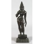 A Bronze Figure of Parvati, Tamil Nadu, South India, early 20th century, standing on a rectangular