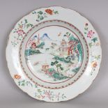 AN 18TH CENTURY CHINESE QIANLONG PERIOD FAMILLE ROSE PORCELAIN SOUP PLATE, painted to its centre