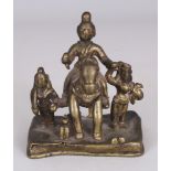 A Bronze Group, Deccan, Southern India, probably 15th/16th century, depicting a male deity on