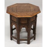 A GOOD 19TH/20TH CENTURY ANGLO INDIAN BRASS INLAID OCTAGONAL WOOD SIDE TABLE, decorated with