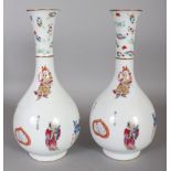 A PAIR OF CHINESE FAMILLE ROSE PORCELAIN BOTTLE VASES, decorated with calligraphy and legendary