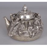 A CHINESE SILVER-METAL TEAPOT & COVER, the sides cast in high relief with the Eight Immortals, the