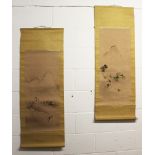 A PAIR OF EARLY 20TH CENTURY SIGNED JAPANESE HANGING SCROLL PAINTINGS ON SILK, each depicting a