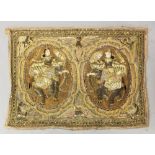 A 20TH CENTURY INDIAN FABRIC WALL HANGING, worked in relief with two scenes of Lakshmi seated on