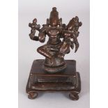 A Bronze Figure of Lakshmi-Narayana, South India, 16th/17th century, the divine couple seated on a