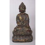 A 20TH CENTURY SINO-TIBETAN GILT BRONZE FIGURE OF BUDDHA, seated in dhyanasana on a double lotus