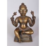 A Bronze Figure of Siva, Deccan, Southern India, 18th century, seated in lalitasana on a rectangular