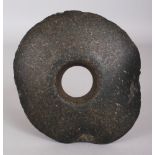 AN EARLY CHINESE NEOLITHIC JADE BI DISC, possibly circa 3000BC, the stone of predominantly green and