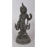 A 19TH/20TH CENTURY NEPALESE STONE INLAID BRONZE BODHISATTVA, cast in a posture of dance on a