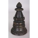 A Small Bronze Stupa, Tibet, 12th century or later, of bell-shaped form, with double lotus base,