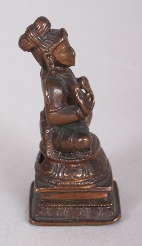 A Bronze Figure of a Tamil Saint, South India, 19th century, the bearded figure seated in - Image 2 of 8