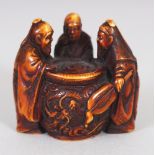 A GOOD QUALITY JAPANESE MEIJI PERIOD STAINED IVORY NETSUKE BY GYOKUZAN, carved in the form of