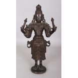 An Important Vijayanagar Bronze Figure of Vishnu, South India, circa 15th century, standing on a