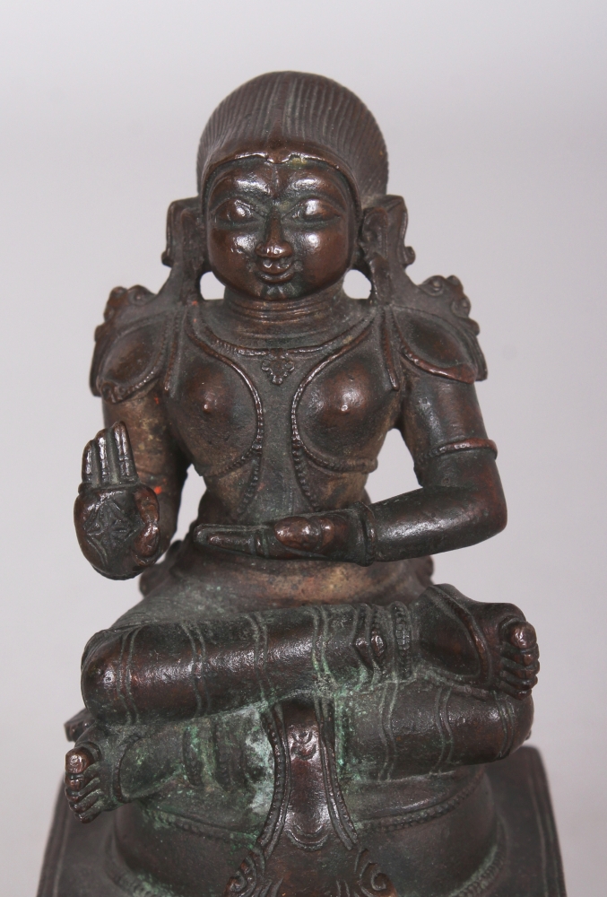 A Bronze Figure of a Tamil Saint, South India, 18th/19th century, seated in sattvasana on a raised - Image 5 of 8