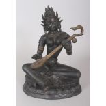 A LARGE 20TH CENTURY NEPALESE BRONZE FIGURE OF A BODHISATTVA, bearing a lute and seated on a lotus