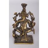 A Brass Figure of Ganesha, Eastern India, circa 18th/19th century, the four-armed, pot-bellied,