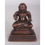 A Bronze Figure of a Tamil Saint, Tamil Nadu, South India, 18th century, seated in sattvasana,on a