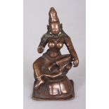 A Small Vijayanagar Bronze Figure of a Female Deity, South India, 15th/16th century, seated in