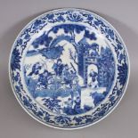 A CHINESE KANGXI STYLE BLUE & WHITE PORCELAIN SAUCER DISH, the base with a six-character Kangxi