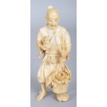 A JAPANESE MEIJI PERIOD IVORY OKIMONO OF A FLOWER SELLER, holding a basket of flowers before him,