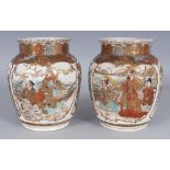 A PAIR OF EARLY 20TH CENTURY JAPANESE SATSUMA EARTHENWARE VASES, each decorated in enamels and heavy