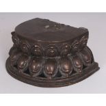 A 17TH/18TH CENTURY TIBETAN BRONZE LOTUS STAND, 5.5in wide at widest point & 2.3in high.