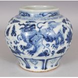 A CHINESE YUAN STYLE BLUE & WHITE PORCELAIN BUDDHISTIC LION JAR, the base unglazed, 6.8in wide at