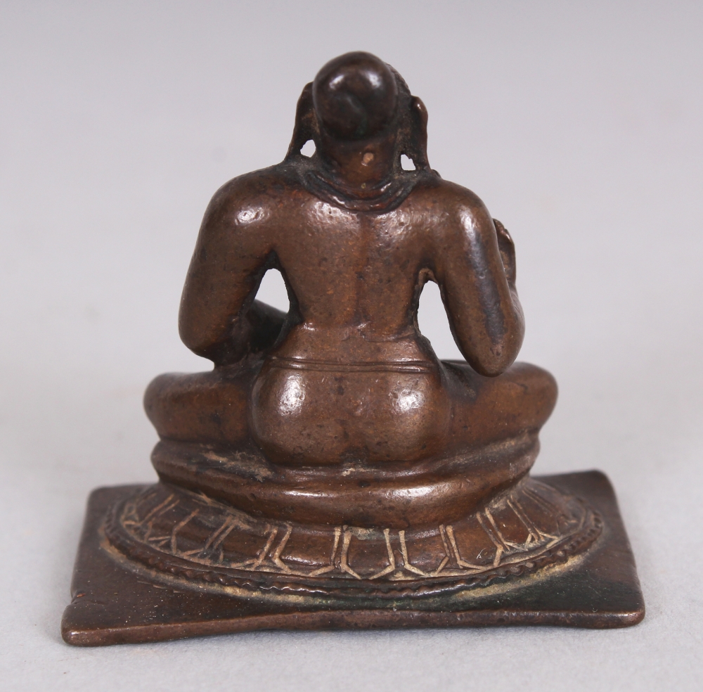 A Small Bronze Figure of a Tamil Saint, South India, 18th/19th century, seated in sattvasana, his - Image 3 of 7
