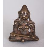 A Small Bronze Figure of Annapurna, Southern India, 18th/19th century, seated with her feet