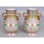 A PAIR OF GOOD QUALITY CHINESE FAMILLE ROSE PORCELAIN HU VASES, together with a fitted box, each