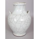 A CHINESE GE STYLE CRACKLEGLAZE PORCELAIN VASE, the shoulders moulded with two lug handles, 7.2in