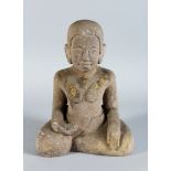 A Burmese Grey Sandstone Figure of Buddha, 20th century, seated with hands in dhyana and bhumisparsa