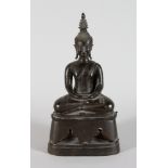 A Bronze Figure of Buddha, Laos, 16th/17th century, seated in sattvasana on a raised openwork