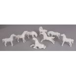 A GROUP OF EIGHT 20TH CENTURY CHINESE BLANC-DE-CHINE PORCELAIN MODELS OF THE EIGHT HORSES OF WANG