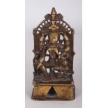 A Jain Bronze Shrine Depicting Ambika, Western India, dated samvat 1522/1465 AD, the four armed