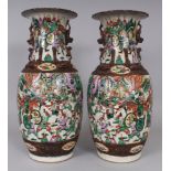 A LARGE PAIR OF CHINESE FAMILLE ROSE-VERTE CRACKLEGLAZE PORCELAIN VASES, circa 1900, each painted