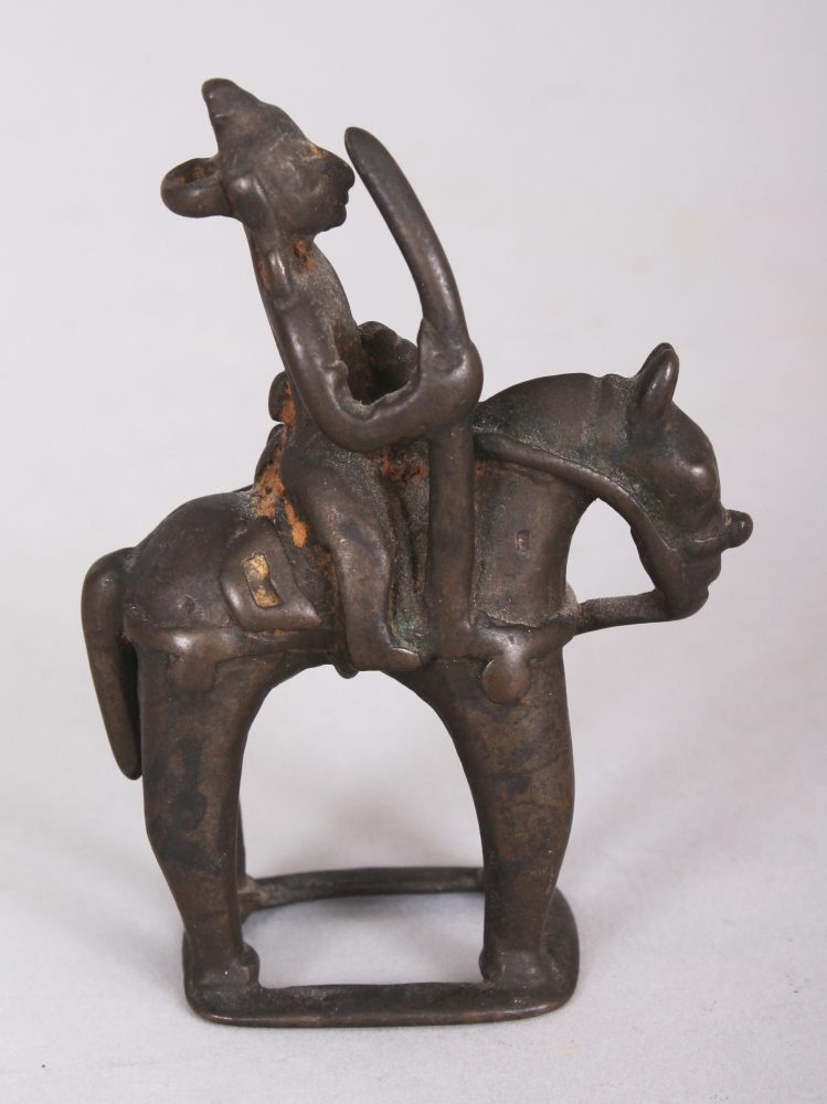 A Bronze Figure of a Deity on Horseback, Eastern India, circa 18th century, holding a spear in his - Image 3 of 9