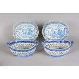 A PAIR OF BLUE AND WHITE WILLOW PATTERN OVAL CHESTNUT BASKETS AND STANDS. 9ins wide.