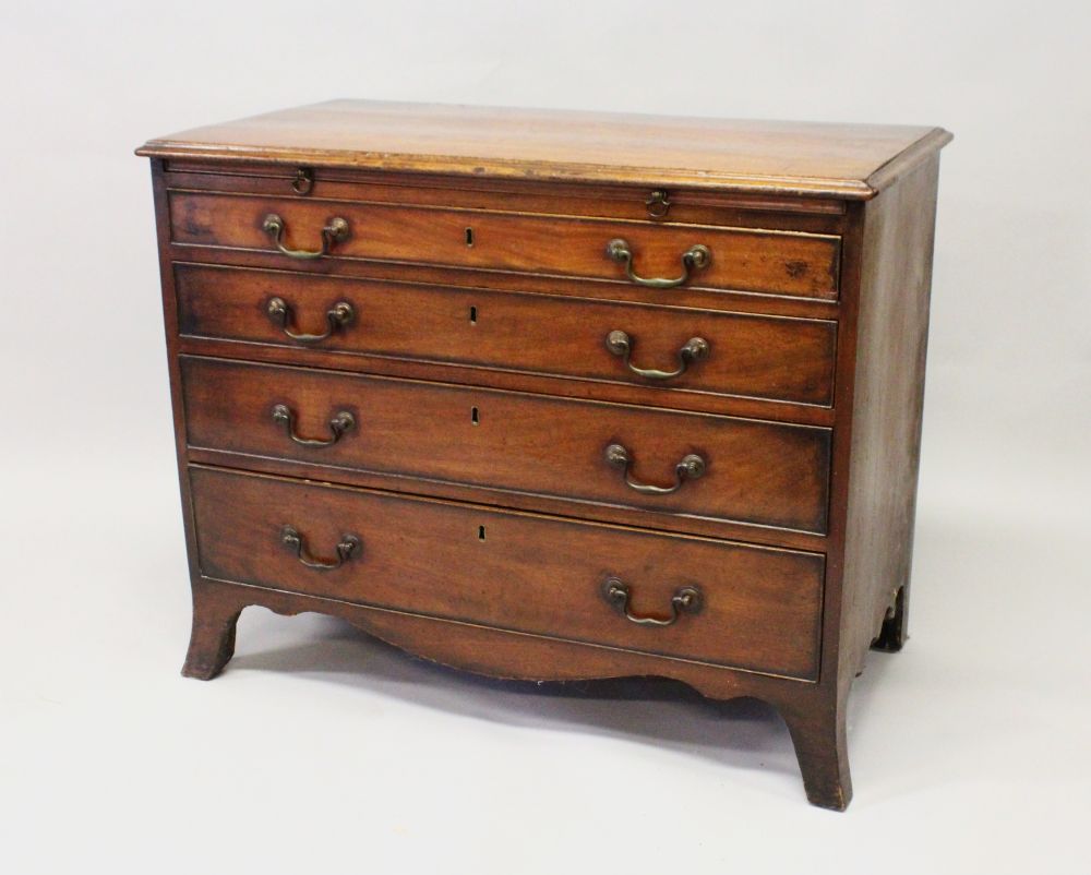 A GEORGE III MAHOGANY BATCHELORS CHEST, with moulded rectangular top, a brushing slide, over four